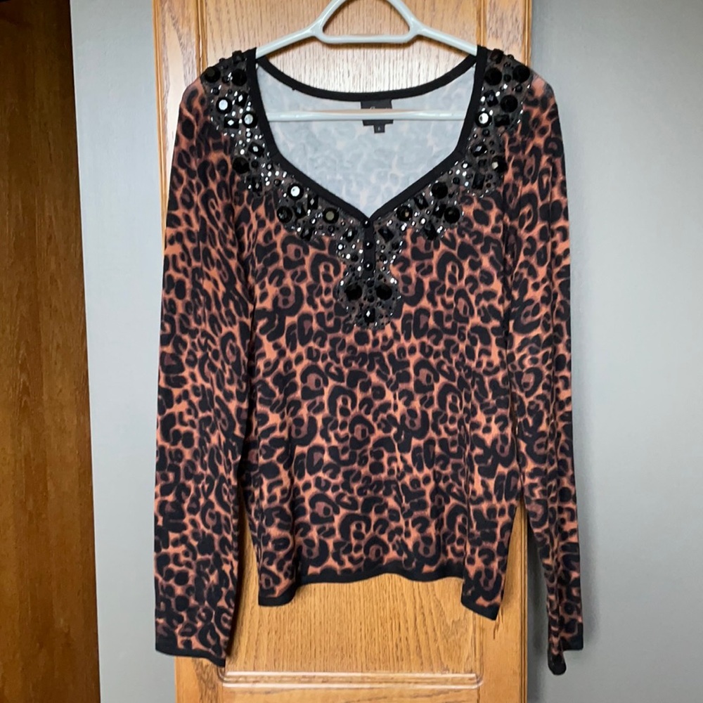 Ladies size large, animal print sweater, embellished on neckline, never worn.